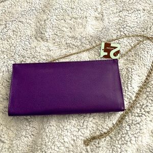 NWT Purple clutch/crossbody bag.